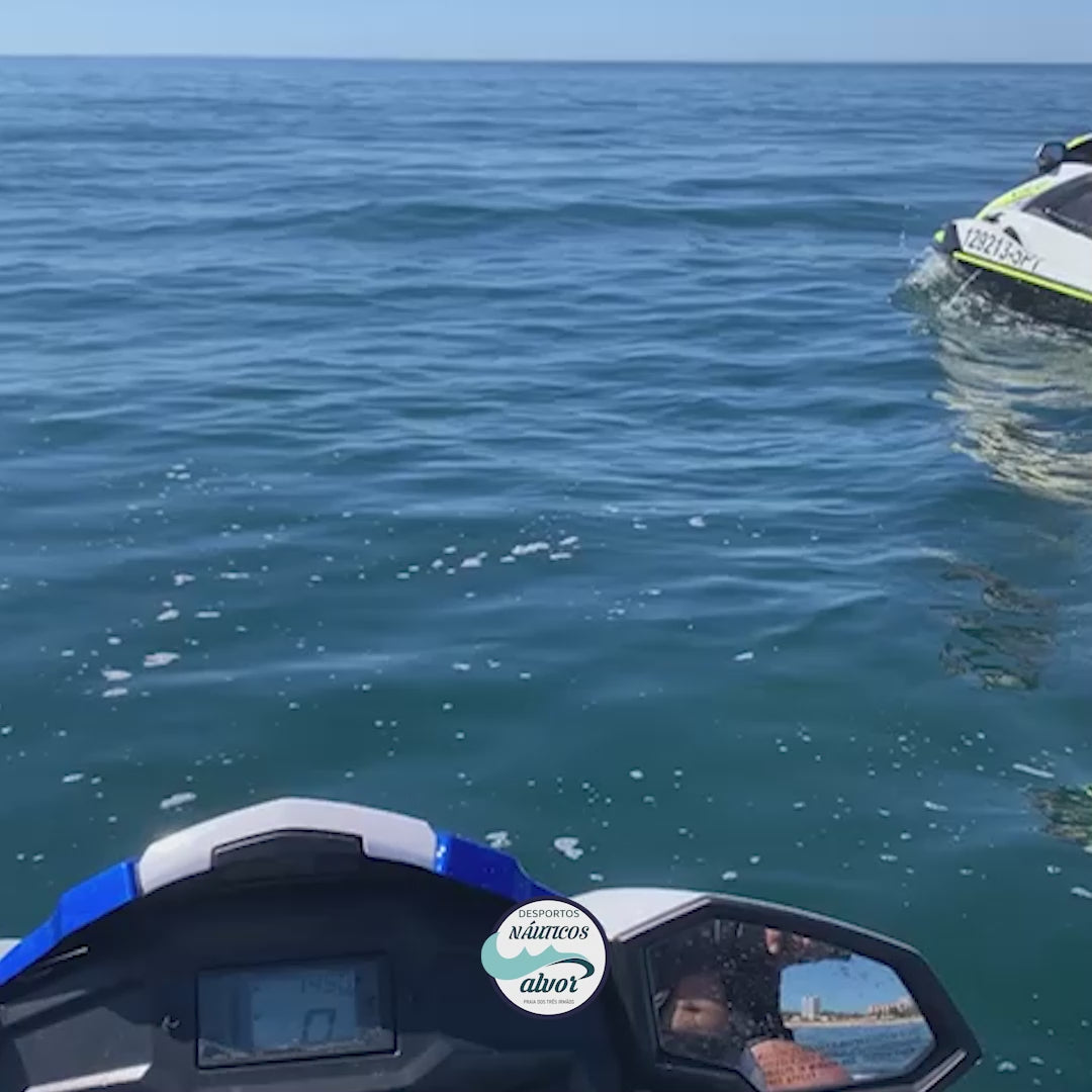Twos jetskis on the clear waters of Alvor, showcasing thrilling water fun.