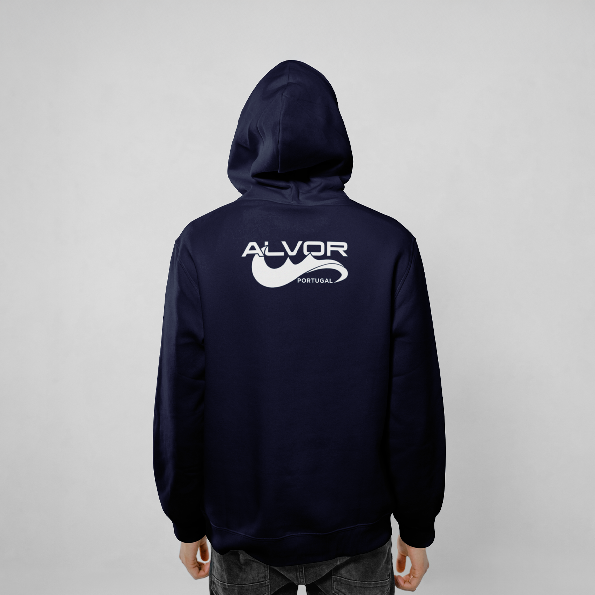 Back view of a navy hoodie with the text 'ALVOR PORTUGAL' printed on it, part of the Sweat Alvor - Desportos Náuticos de Alvor collection.